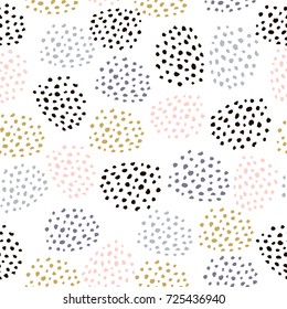 Seamless vector pattern with ink drawn dots. Creative minimalistic crafted background. Great for fabric, wrapping paper, textile