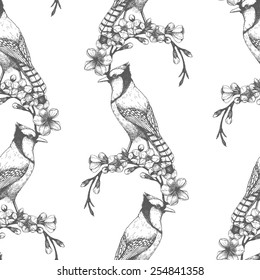 Seamless vector pattern with ink hand drawn birds on blooming cherry tree twigs isolated on white. Vintage sketch background.