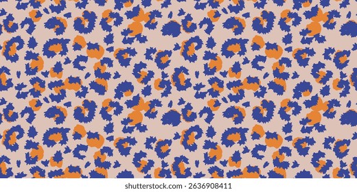 Seamless vector pattern inspired by leopard print with a modern twist. Features bold blue spots on a beige background with yellow accents. Perfect for fashion, textiles, design