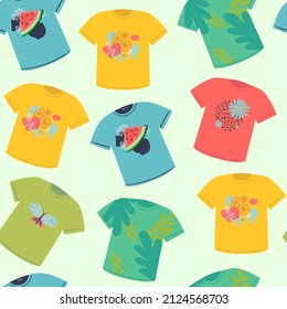 Seamless vector pattern with isolated colorful T-shirts with fashion prints on ligth background for your design