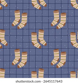 Seamless vector pattern Knitted homewear, socks and wool accessories in a soft, autumn-themed pattern. Perfect for hygge-inspired fabric, wallpaper, textile prints.