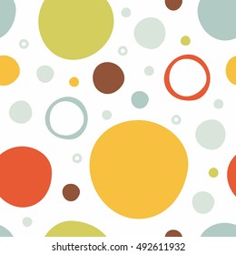 Seamless vector pattern with large colored circles of various sizes on white background. Childish background for wallpaper, papers, textiles, bed linen, tissue 1.1