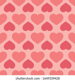 Seamless vector pattern with large and small hearts in shades of pink arranged in rows. Minimal Valentine’s Day design great for holiday products, packaging, fabric, home decor, stationery, gifts.