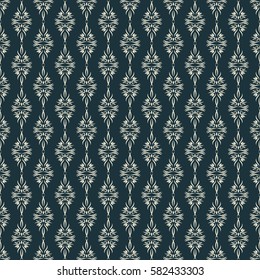 Seamless vector pattern. Light cream ornament of curves and swirls on a dark background