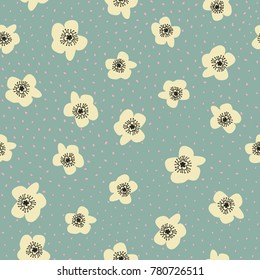Seamless vector pattern with light yellow flowers and dots on blue background