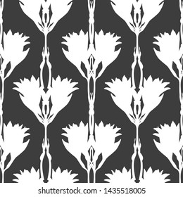 Seamless vector pattern of Lily flowers. Black and white graphics. White silhouettes on a black background. For decor and design of fabric, paper, Wallpaper, packaging.
