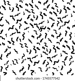 Seamless vector pattern with little waves. Wavy freehand scribbles in Memphis style. Thin lines, dashes, and smears. Black and white retro mosaic texture. Hand-drawn grunge ink vector illustration
