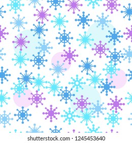 Seamless vector pattern with lots of snowflakes of different color. Winter background. Christmas wrapping paper