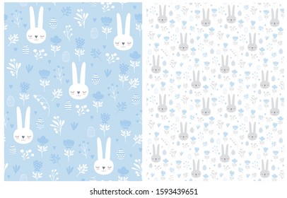 Seamless Vector Pattern with Lovely Easter Eggs,Cute Bunnies and Floral Print.Lovely Rabbits in a Hand Drawn Garden.Easter Vector Print for Fabric,Textile.Floral Design on a Blue and White Background.