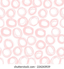 Seamless vector pattern made with hand drawn pink circles. Vector illustration.