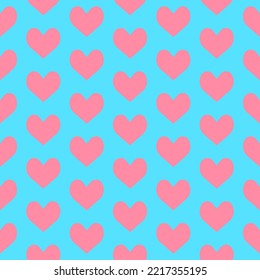 Seamless vector pattern made of pink hearts on blue