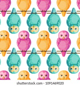 Seamless vector pattern with magenta, cyan, yellow owls. Repetitive background with vector birds turquoise, pink, golden yellow colors. Cute funny owls in the repetitive seamless vector pattern.