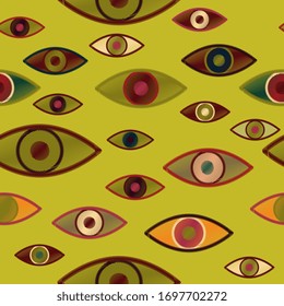 Seamless vector pattern with magical,witchcraft eyes on a chartreuse yellow green color background.Imitation of embroidery with threads on fabric.Fashionable and stylish design for fabric