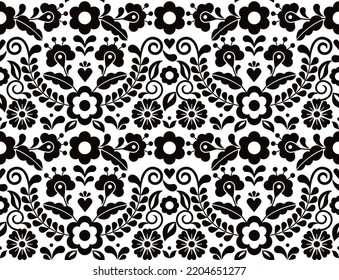 Seamless vector pattern with Mexican floral morif, black and white textile or fabric print design inspired by traditional embroidery crafts from Mexico. Decorative monochrome background