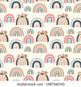 seamless vector pattern with multicolored abstract rainbows on a beige background, for childrens and modern designs	

