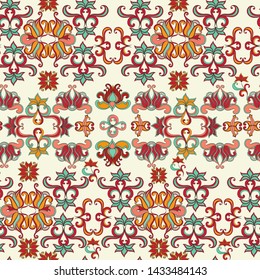 Seamless vector pattern with multicolored ornaments on a light background.