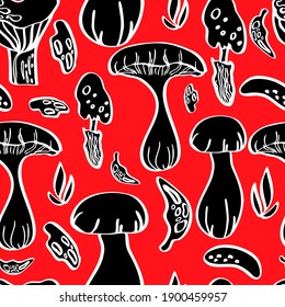 seamless vector pattern mushrooms on red background