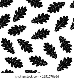 Seamless vector pattern of oak leaves, silhouette, autumn leafy background.