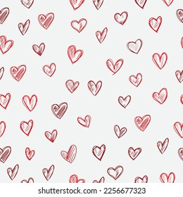 Seamless vector pattern on a light pink background scarlet hearts. For a declaration of love or Valentine's Day. 