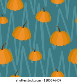 seamless vector pattern of orange pumpkins on blue background