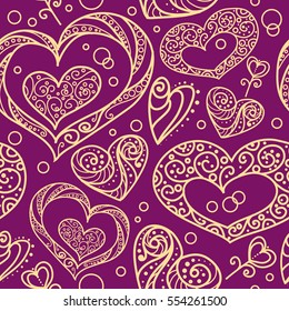Seamless vector pattern with ornamental decorative hearts. Yellow contour on purple background. Romance and Valentine's day theme.