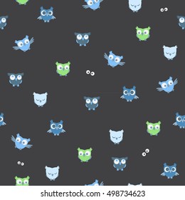 The seamless vector pattern with owls on black background.