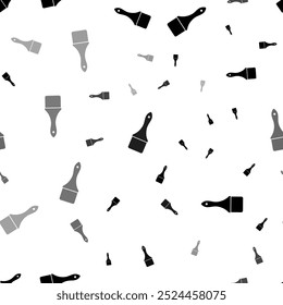 Seamless vector pattern with paint brush symbols, creating a creative monochrome background with rotated elements. Vector illustration on white background