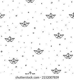Seamless vector pattern of paper boats on white background
