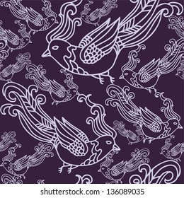 Seamless vector pattern with paradise birds on dark violet background