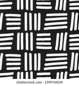 Seamless vector pattern with parallel short lines and stripes. Hand drawn abstract shapes in black and white. Decorative texture for print, textile, packaging, wrapping, web. Isolated repetitive tiles