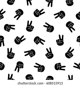 Seamless vector pattern - peace hand symbol