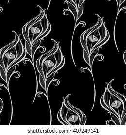 Seamless vector pattern with peacock feathers on a black background.