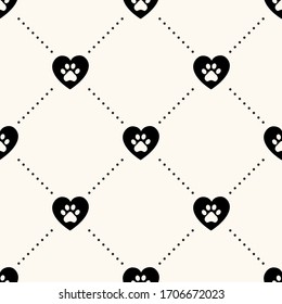 Seamless vector pattern with pet footprints in hearts and polka dot. Paw prints on my heart. Illustration of animal lover or pet care.