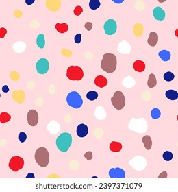 Seamless vector pattern pink background with multi-colored spots and dots drawn by hand. Bright confetti

