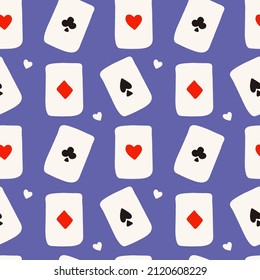 Seamless vector pattern with playing cards on blue background. Design for fabric and paper, surface textures.