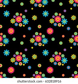Seamless vector pattern for printing. Bright blue, yellow, green and pink flowers and circles on a black background