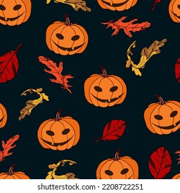 Seamless vector pattern of pumpkins and colorful leaves on a dark blue background. Halloween.