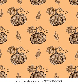 Seamless vector pattern with pumpkins and leaves. It is used for fabric making, wrapping paper, design and wallpaper. Vegetable autumn background of pumpkins and leaves. Beautiful ornament.Flat style.