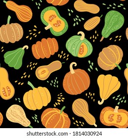 Seamless vector pattern with pumpkins and seeds. Autumn illustration for fabric, textile, cloth, wallpaper