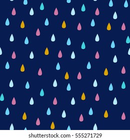 Seamless vector pattern with rain drops in blue, yellow and pink on navy background. 