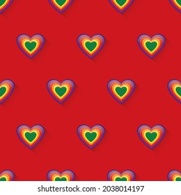 Seamless vector pattern of rainbow glossy heart and shadow on a red background, repeat pattern, the concept for LGBT pattern design.