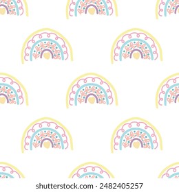 Seamless vector pattern with a rainbow image. Perfect for printing on both fabric and paper