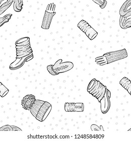 Seamless vector pattern with realistic hand drawn hat with a pompom, scarf, mittens and shoes with knitted cuffs. Set knitted seasonal winter traditional accessories with ornament vector illustration