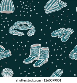 Seamless vector pattern with realistic hand drawn hat with a pompom, scarf, mittens and shoes with knitted cuffs. Set knitted seasonal winter traditional accessories with ornament vector illustration