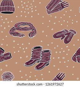 Seamless vector pattern with realistic hand drawn hat with a pompom, scarf, mittens and shoes with knitted cuffs. Set knitted seasonal winter traditional accessories with ornament vector illustration