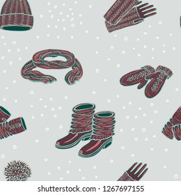 Seamless vector pattern with realistic hand drawn hat with a pompom, scarf, mittens and shoes with knitted cuffs. Set knitted seasonal winter traditional accessories with ornament vector illustration