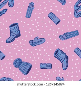 Seamless vector pattern with realistic hand drawn hat with a pompom, scarf, mittens and shoes with knitted cuffs. Set knitted seasonal winter traditional accessories with ornament vector illustration