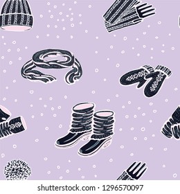 Seamless vector pattern with realistic hand drawn hat with a pompom, scarf, mittens and shoes with knitted cuffs. Set knitted seasonal winter traditional accessories with ornament vector illustration