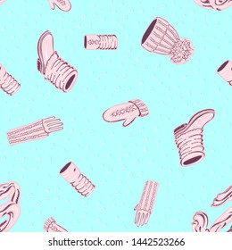 Seamless vector pattern with realistic hand drawn hat with a pompom, scarf, mittens and shoes with knitted cuffs. Set knitted seasonal winter traditional accessories with ornament vector illustration