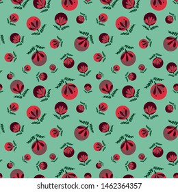 A seamless vector pattern with red christmas baubles on green background. Surface print design.